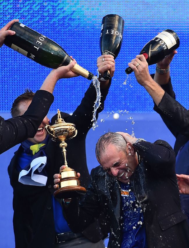 Team Europe captain Paul McGinley is doused with champagne after the Ryder Cup win on Sunday.   AFP-Yonhap