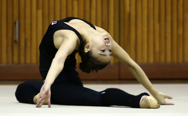 Korean rhythmic gymnast Son Yeon-jae takes part in a practice session for the Asian Games on Monday. The rhythmic gymnastics competition starts on Wednesday.   Yonhap