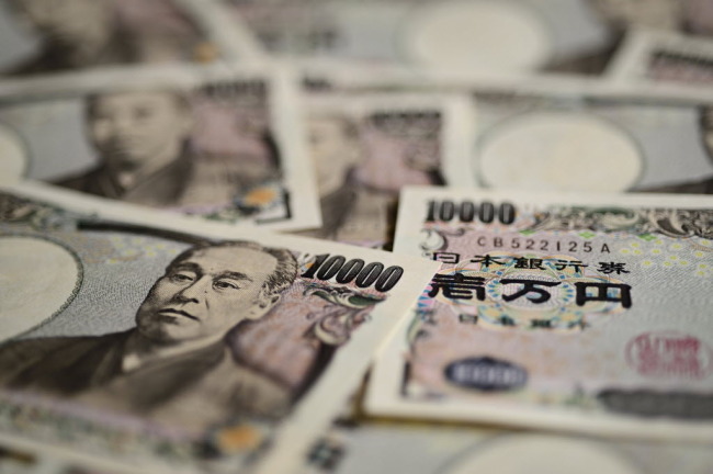 Japanese 10,000 yen banknotes are arranged for a photograph.
Bloomberg