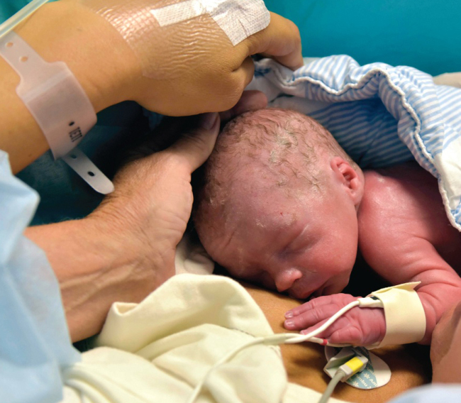 The world’s first baby born to a woman with a transplanted womb is shown after his birth in Gothenburg, Sweden.    AP-Yonhap