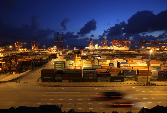 Shipping containers are stacked at the Yangshan Deep Water Port in Shanghai.   Bloomberg
Shipping containers are stacked at the Yangshan Deep Water Port in Shanghai.   Bloomberg