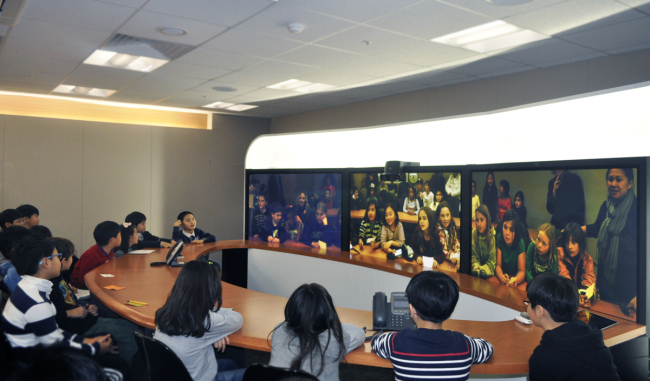 Students of Chadwick International in Songdo, Incheon, participate in a discussion session with students of the international school’s U.S. campus in a teleconference room.   Chadwick International