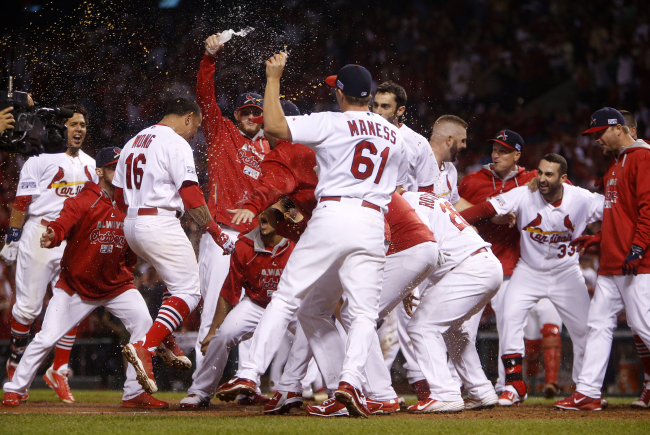 St. Louis Cardinals second baseman Kolten Wong (16) celebrates his game-winning home run on Sunday.   MCT
St. Louis Cardinals second baseman Kolten Wong (16) celebrates his game-winning home run on Sunday.   MCT