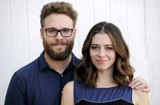 Actors-writers Seth Rogen and his wife Lauren Miller Rogen pose together for a portrait in Los Angeles.   Chris Pizzello/AP