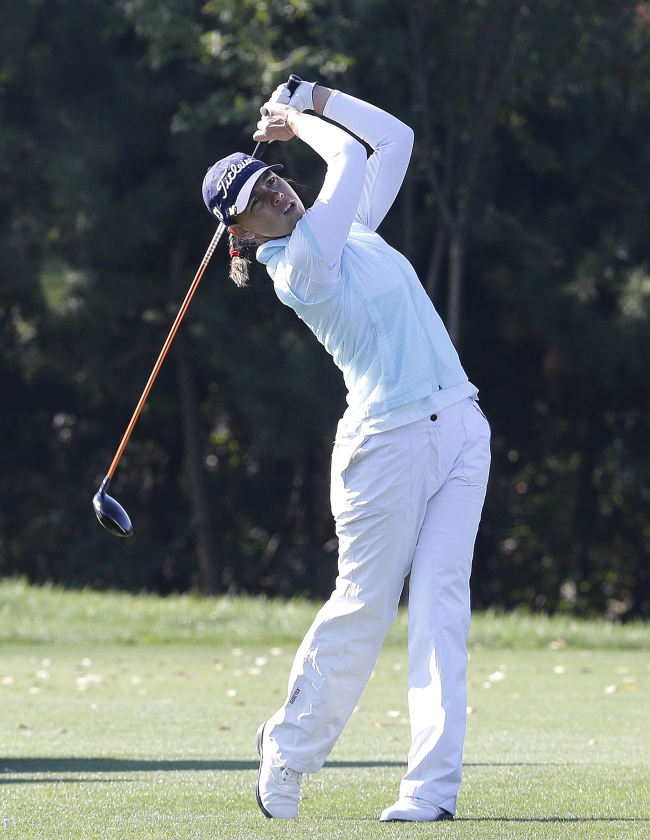 Karine Icher watches her shot on the fourth hole during the second round of the LPGA KEB-HanaBank Championship golf tournament at Sky72 Golf Club in Incheon on Friday.   AP-Yonhap