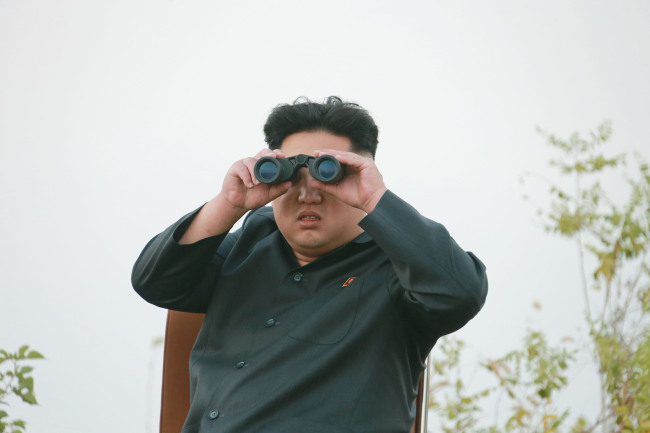 North Korea’s media reported Sunday that its leader Kim Jong-un inspected an air base.  (Yonhap)