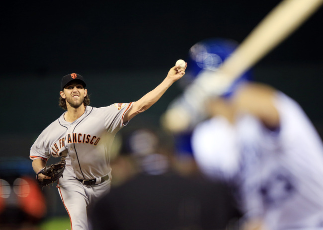 <YONHAP PHOTO-0541> San Francisco Giants pitcher Madison Bumgarner throws during the first inning of Game 1 of baseball's World Series against the Kansas City Royals Tuesday, Oct. 21, 2014, in Kansas City, Mo. (AP Photo/Jamie Squire, Pool)/2014-10-22 09:56:49/ <저작권자 ⓒ 1980-2014 ㈜연합뉴스. 무단 전재 재배포 금지.>
San Francisco Giants pitcher Madison Bumgarner throws during the World Series against the Kansas City Royals on Tuesday.   AP-Yonhap