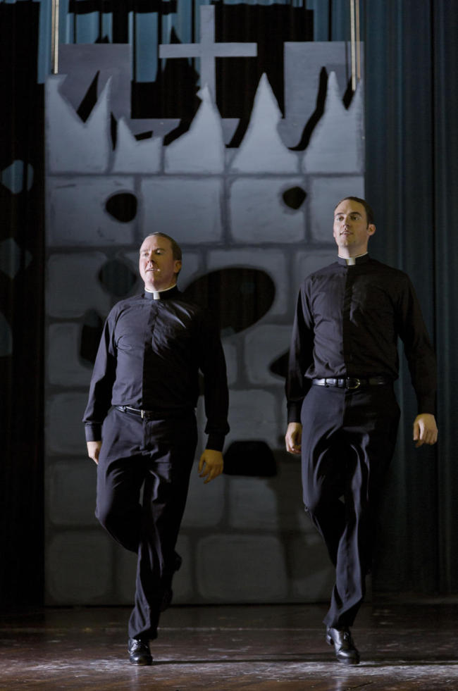 Father David Rider (left) and father John Gibson dance before an interview with the Associated Press at the Pontifical North American College in Rome.    AP