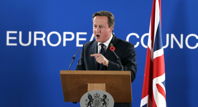 British Prime Minister David Cameron speaks during a media conference after an EU summit at the EU Council building in Brussels on Friday.   AP-Yonhap
