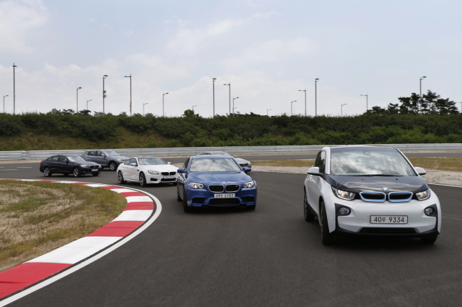 Vehicles race on a track at BMW Driving Center on Yeongjongdo Island, Incheon.   BMW Korea