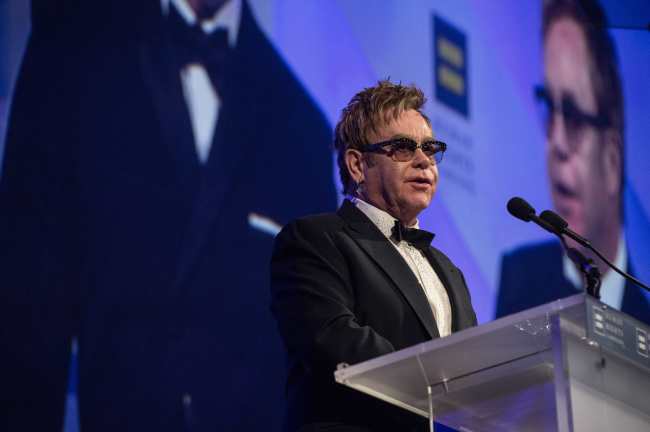 <YONHAP PHOTO-0288> Musician Elton John speaks after he and partner film maker David Furnish were presented HRC's National Equality Award at the 18th annual Human Rights Campaign (HRC) National Dinner in Washington on October 25, 2014. HRC is the largest US civil rights organization working to achieve equality for lesbian, gay, bisexual and transgender people. AFP PHOTO/Nicholas KAMM../2014-10-26 11:59:10/ <저작권자 ⓒ 1980-2014 ㈜연합뉴스. 무단 전재 재배포 금지.>
Musician Elton John speaks after he and partner film maker David Furnish were presented HRC’s National Equality Award at the 18th annual Human Rights Campaign National Dinner in Washington on Saturday.   AFP-Yonhap
Musician Elton John speaks after he and partner film maker David Furnish were presented HRC’s National Equality Award at the 18th annual Human Rights Campaign National Dinner in Washington on Saturday.   AFP-Yonhap