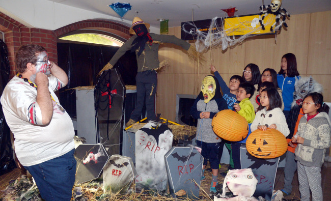 Students in costumes at Seoul English Village celebrate Halloween, a yearly celebration observed in a number of countries in Seoul on Friday.   Kim Myung-sub/The Korea Herald