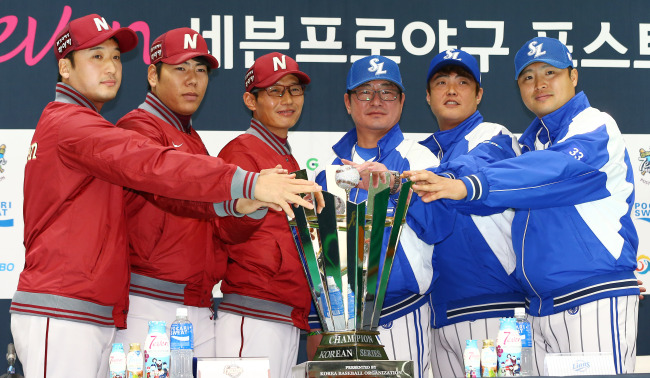 Managers and player representatives of the Korean Series teams take part in a press conference on Monday.   Yonhap