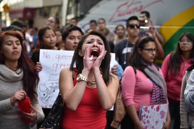 Relatives and peers of the 43 missing students arrive for a meeting with Mexican Attorney General Jesus Murillo Karam at the attorney general building in Mexico City on Tuesday.   AFP-Yonhap
