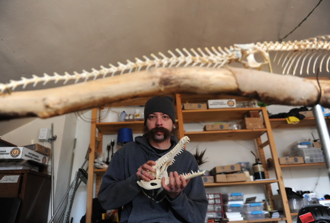Bill Wilson, who also goes by Biilzebub the Bone Collector, poses for a portrait inside his workshop on the South Side in Pittsburgh on Oct. 23.
(Pittsburgh Post-Gazette/MCT)