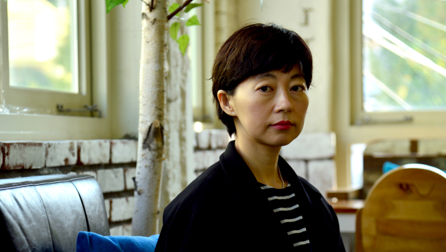 Film director Boo Ji-young poses before an interview with The Korea Herald in Samcheong-dong, Seoul, last week.    Yoon Byung-chan/The Korea Herald