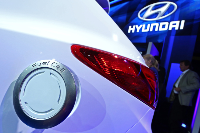 The hydrogen tank cover on a Hyundai Tucson fuel cell vehicle is seen at the 2013 LA Auto Show.   Bloomberg