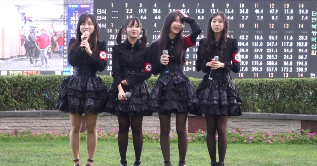 Rookie K-pop girl group Pritz was criticized for its outfits that bore similar features to Nazi uniforms.   YouTube screen capture