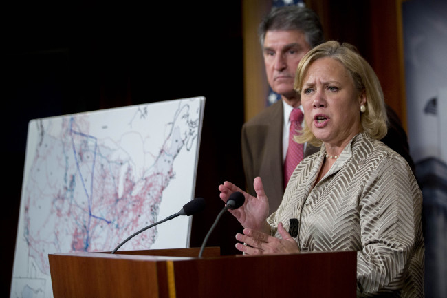 Senator Mary Landrieu, a Democrat from Louisiana, right, speaks as Senator Joe Manchin, a Democrat from West Virginia, looks on during a news conference at the U.S. Capitol in Washington, D.C., U.S., on Tuesday, Nov. 18, 2014. The U.S. Senate refused to approve TransCanada Corp.'s $8 billion Keystone XL pipeline after years of a political fight over jobs, climate change and energy security. Photographer: Andrew Harrer/Bloomberg *** Local Caption *** Mary Landrieu; Joe Manchin
Sen. Mary Landrieu (right), speaks as Sen. Joe Manchin looks on during a news conference at the U.S. Capitol in Washington, Tuesday.   Bloomberg