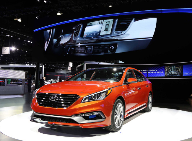 A Hyundai Sonata stands at the carmaker’s booth during the LA Auto Show on Wednesday.   Hyundai Motor