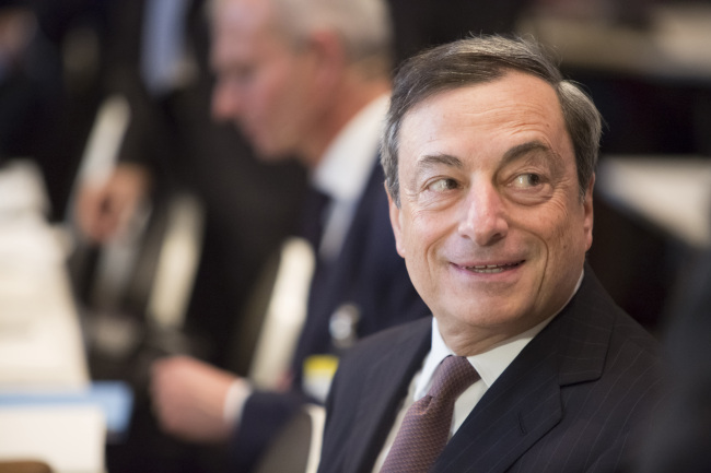 Mario Draghi, president of the European Central Bank (ECB), reacts at the European Banking Congress at the Alte Oper concert hall in Frankfurt, Germany, on Friday, Nov. 21, 2014. Draghi said the ECB must drive inflation higher quickly, and will broaden its asset-purchase program if needed to achieve that. Photographer: Martin Leissl/Bloomberg *** Local Caption *** Mario Draghi
European Central Bank head Mario Draghi.    Bloomberg