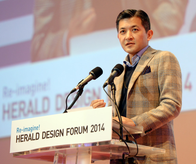 Herald Corporation chairman Jungwook Hong gives the opening speech at the 2014 Herald Design Forum in Dongdaemun Design Plaza in Seoul on Wednesday. (Park Hyun-koo/The Korea Herald)