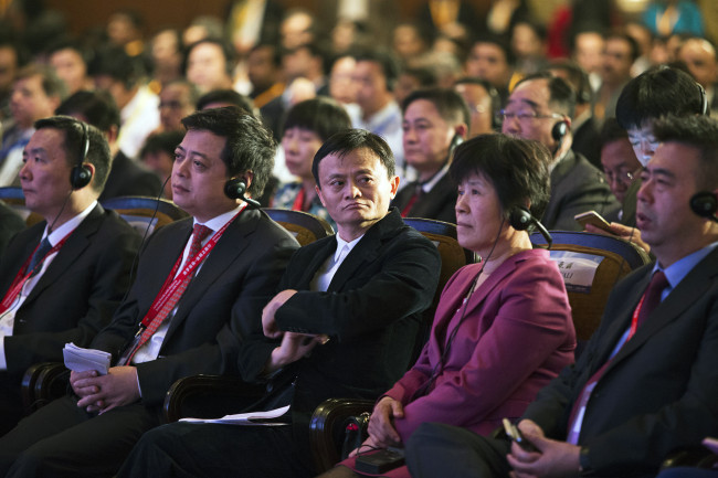 Billionaire Jack Ma (center), chairman of Alibaba Group Holding, attends the India-China Business Cooperation Conference in New Delhi on Wednesday.    Bloomberg