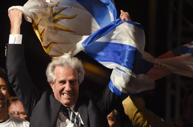 Presidential candidate for the ruling Broad Front party Tabare Vazquez celebrates in Montevideo on Sunday.   AP-Yonhap