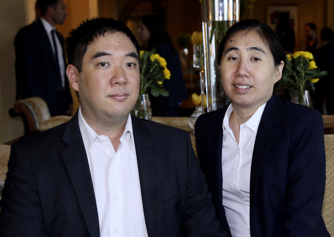 Grace (right) and Matthew Huang.   AP-Yonhap