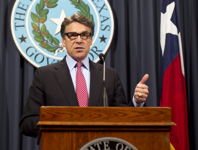 Texas Gov. Rick Perry speaks during a news conference at the Capitol in Austin on Wednesday.   AP-Yonhap