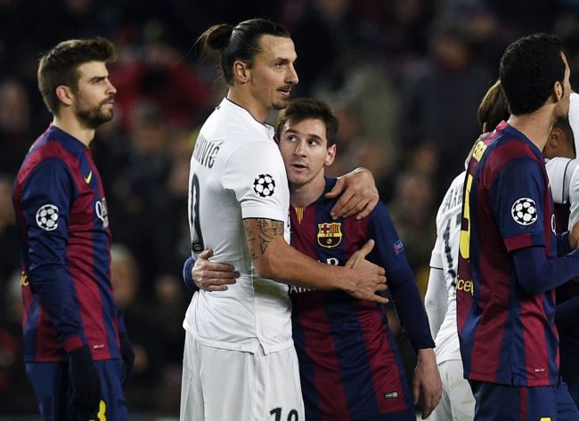 Paris Saint-Germain striker Zlatan Ibrahimovic (left) hugs Barcelona forward Lionel Messi on Wednesday.   AFP-Yonhap