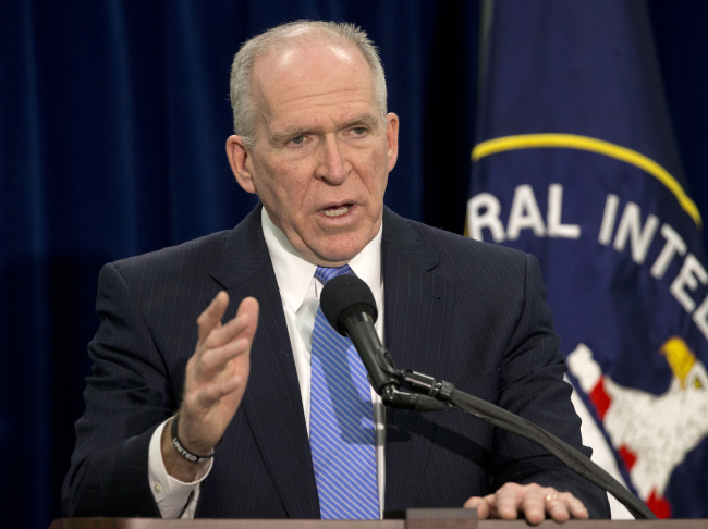 U.S. Central Intelligence Agency Director John Brennan gestures during a news conference at CIA headquarters in Langley, Virginia, Thursday.   AP-Yonhap