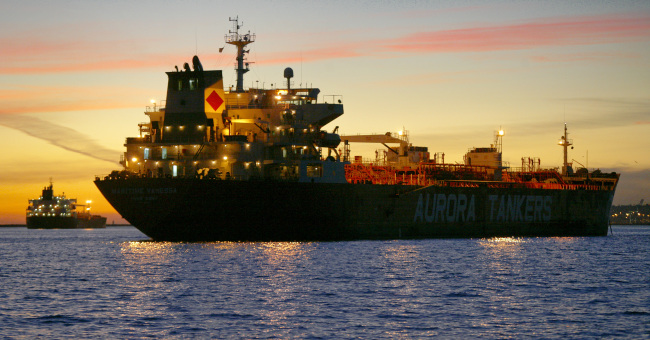 Oil tankers are anchored near the Port of Long Beach, California.   Bloomberg