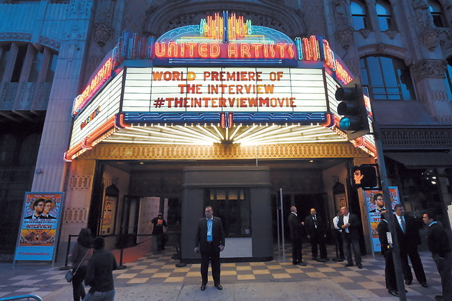 Security is seen outside The Theatre at Ace Hotel before the premiere of “The Interview” in Los Angeles on Dec. 11. AFP-Yonhap