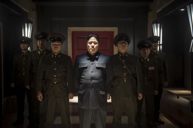 Actor Randall Park (center) portrays North Korean leader Kim Jong-un in Columbia Pictures’ “The Interview.”   AP-Yonhap