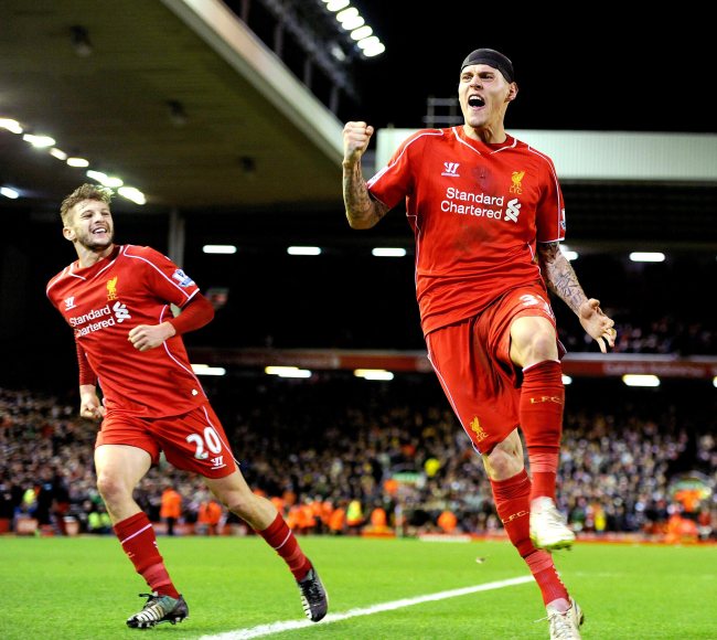 Liverpool’s Martin Skrtel (right) celebrates his goal on Sunday.   EPA-Yonhap