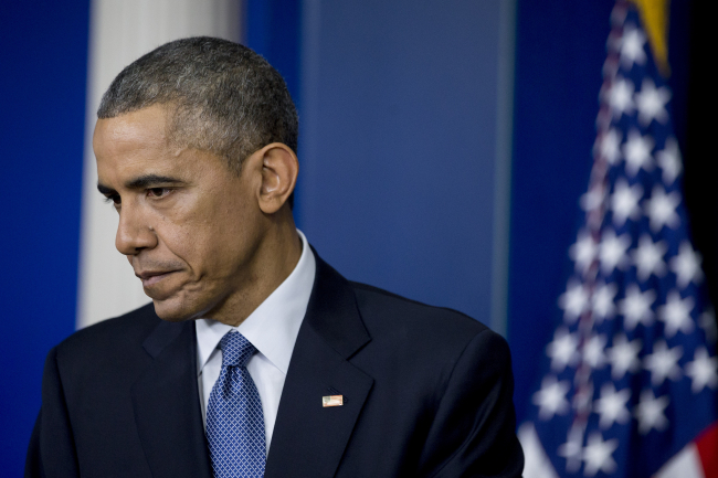 U.S. President Barack Obama listens to a question during a news conference at the White House in Washington, D.C., Friday.   Bloomberg
