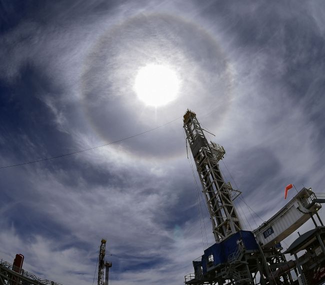 View of oil drilling rigs at Vaca Muerta Shale oil reservoir at Loma Campana, Buenos Aires, Argentina.   AFP-Yonhap