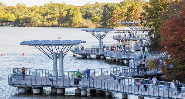 Joggers and walkers make their way onto the Ann and Roy Butler Hike-and-Bike Trail at Lady Bird Lake on Nov. 23. Austin American-Statesman/TN