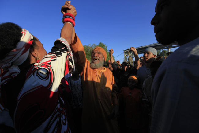 Ben Ammi Ben Israel is greeted by the crowd during festivities marking the holiday of Shavuot in the southern Israeli town of Dimona on  June 7, 2009.   AP