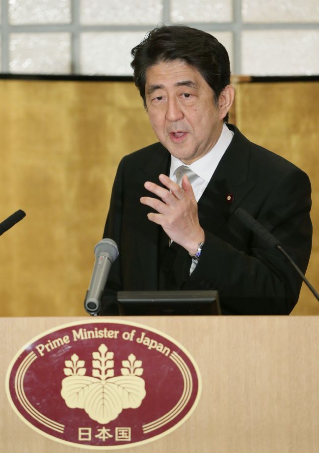 Japanese Prime Minister Shinzo Abe speaks to the press after he visited the Ise shrine in Ise in Mie prefecture, central Japan, Monday.   AFP-Yonhap