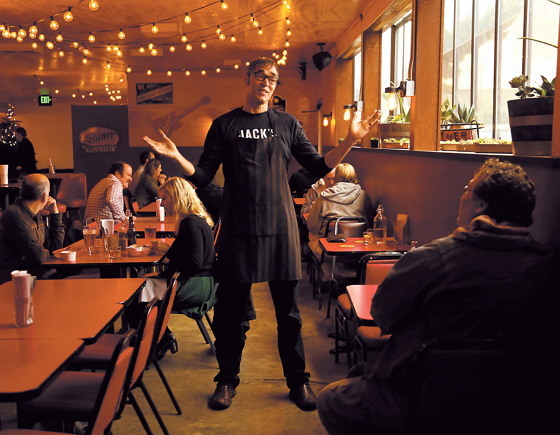 “This (restaurant work) is the entertainment industry — it’s fun. We’re puttin’ on a show every night,” says Jack Timmons, owner of Jack’s BBQ. (Erika Schultz/Seattle Times/TNS)
