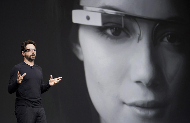 Google cofounder Sergey Brin wears the Google Project Glass at a conference in San Francisco, California.   Bloomberg