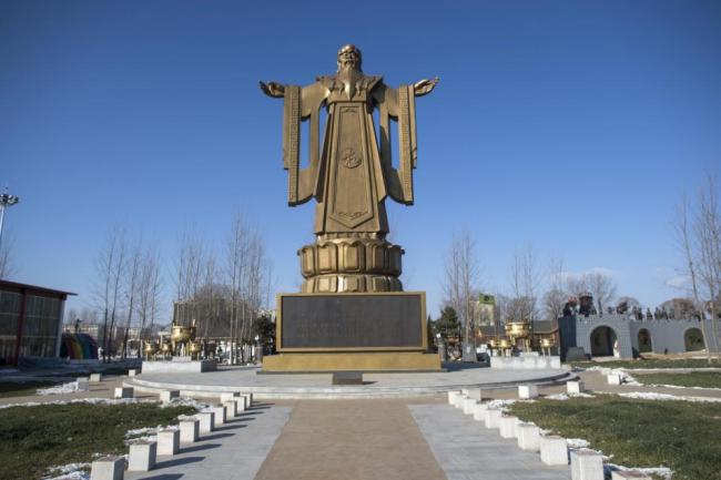 A Confucius statue stands tall in the seaside resort in Beidaihe, Hebei province, China. (AFP)