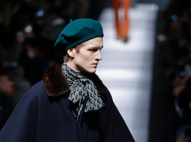 A model wears a creation for Gucci men’s fall-winter 2015-2016 collection, part of the Milan Fashion Week in Italy on Monday. AP