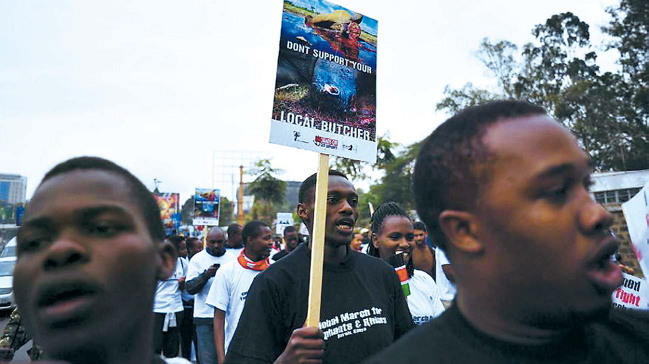 Hundreds of Kenyans join conservationists and activists for a march demanding action to stop soaring rhino and elephant poaching in Nairobi. (AFP)