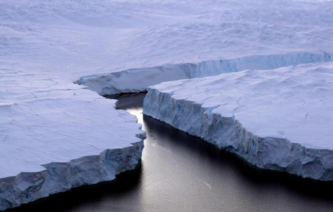 An iceberg breaking off Knox Coast in the Australian Antarctic Territory.   AFP