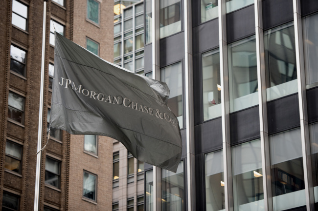 A JPMorgan flag flies at the company’s headquarters in New York. Bloomberg