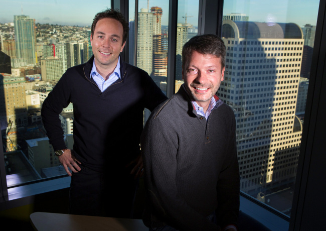 Zillow CEO Spencer Rascoff (left) and chief economist Stan Humphries pose in their downtown Seattle office.   Ellen M. Banner/Seattle Times/TNS