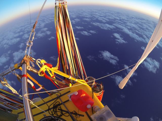 In this photo provided by the Two Eagles Balloon Team, Troy Bradley of New Mexico and Leonid Tiukhtyaev of Russia set off from Saga, Japan, shortly before 6:30 a.m. on Sunday.   AP-Yonhap